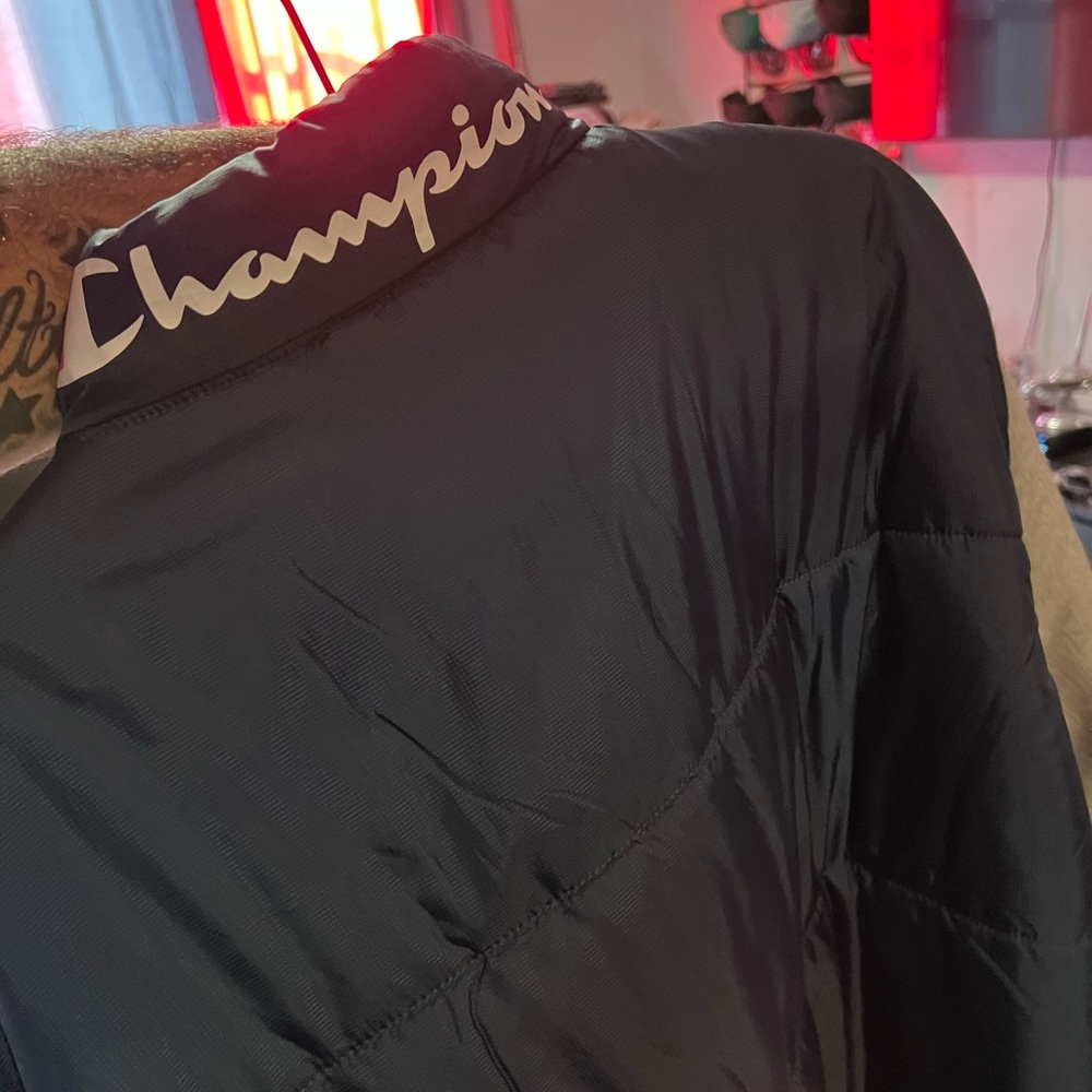 One champion brand new jacket, one Chicago Bulls hoodie and one Lakers hoodie